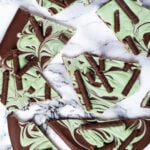 Overhead shot of mint chocolate bark broken into pieces.