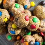 An overhead image of No-Bake Monster Cookie Bites scattered in a pile.