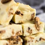 Pieces of Milk & Cookies Chocolate Fudge arranged on a small white plate.